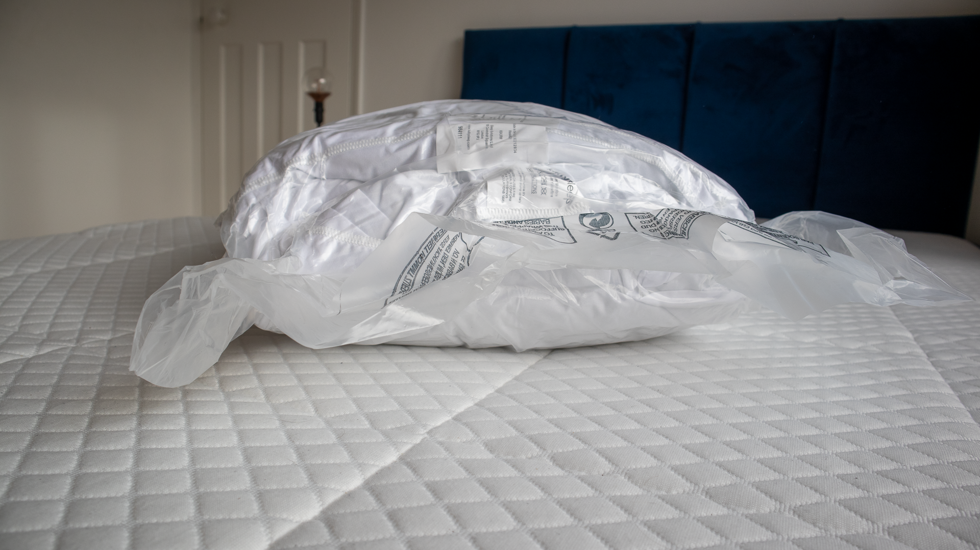 kally sleep pillow layers in plastic